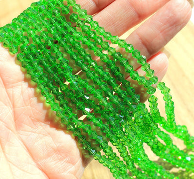 The Bead Store A Grade 4mm Glass Bicones ~ Green ~ approx. 85 beads/string