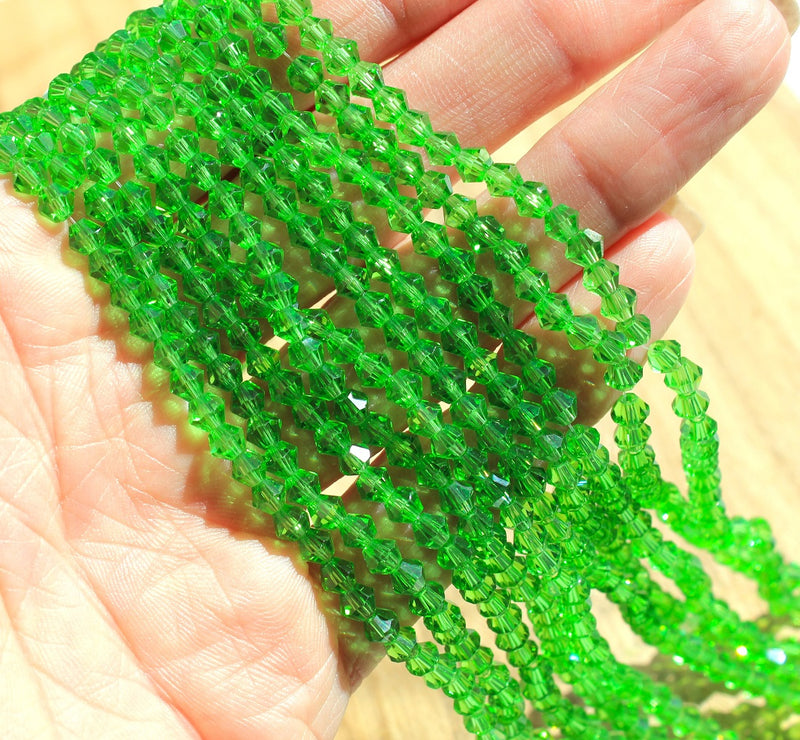 The Bead Store A Grade 4mm Glass Bicones ~ Green ~ approx. 85 beads/string