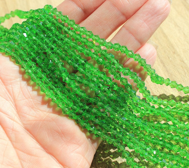 The Bead Store A Grade 4mm Glass Bicones ~ Green ~ approx. 85 beads/string