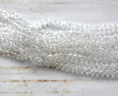 The Bead Store Crystal Clear 3mm Glass Bicones  110 Beads / String