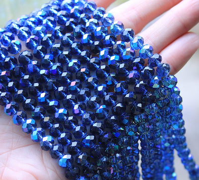 The Bead Store String of 8x6mm Faceted Glass Rondelle Beads Montana Blue AB
