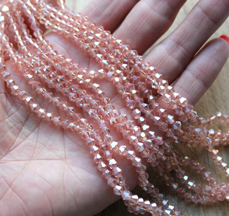 4mm Electroplated Crystal Glass Bicones ~ Pink AB ~ approx. 87 beads/string
