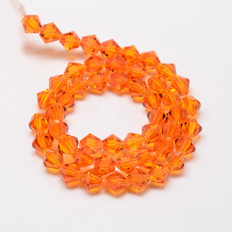 A Grade 4mm Glass Bicones ~ Orange ~ approx. 85 beads/string