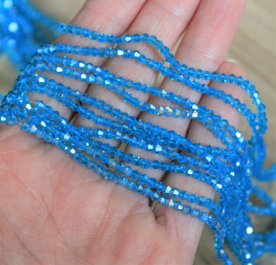 1 Strand of 2mm Glass Bicones ~  Lustred Lt. Blue ~ approx. 200 beads