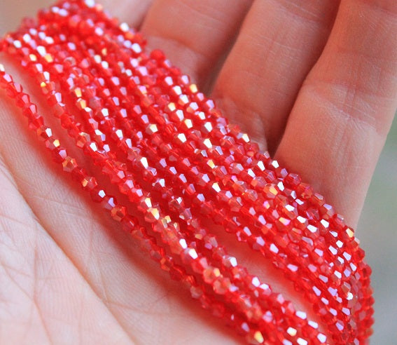 1 Strand of 2mm Glass Bicones ~  Red AB ~ approx. 200 beads