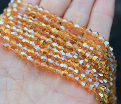 4mm Glass Bicones ~ approx. 96 Beads / String ~ Gold AB