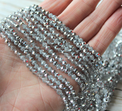 1 Strand of 4x3mm Faceted Glass Rondelle Beads ~ Half Silver Plated Crystal Clear ~ approx. 130 beads