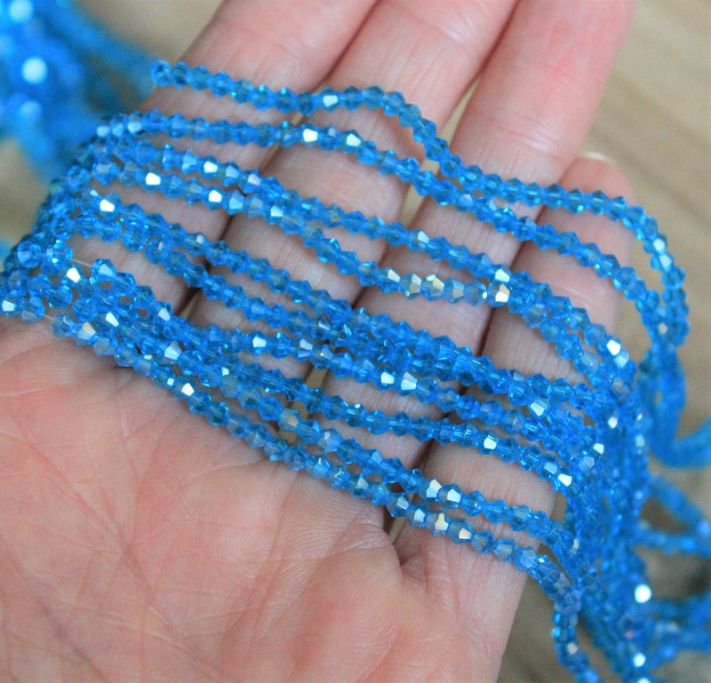 The Bead Store 2mm Glass Bicones ~  Lustred Blue ~ approx. 150 beads