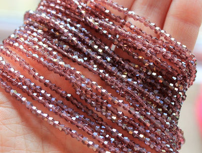 The Bead Store 2mm Glass Bicones ~  Plum AB ~ approx. 200 beads