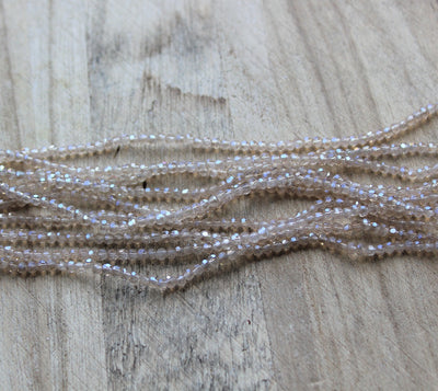 2mm Round Faceted Glass Beads ~ Beige AB ~ approx. 200 beads / string