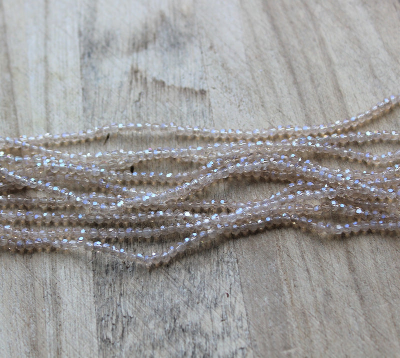 2mm Round Faceted Glass Beads ~ Beige AB ~ approx. 200 beads / string