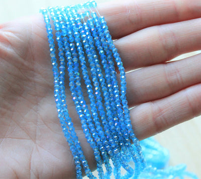 2mm Round Faceted Glass Beads ~ Sky Blue AB ~ approx. 200 beads / string