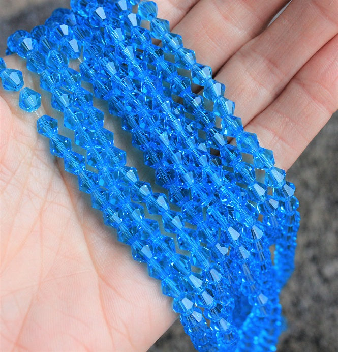6mm Glass Bicones ~ Light Blue ~ 50 beads/string